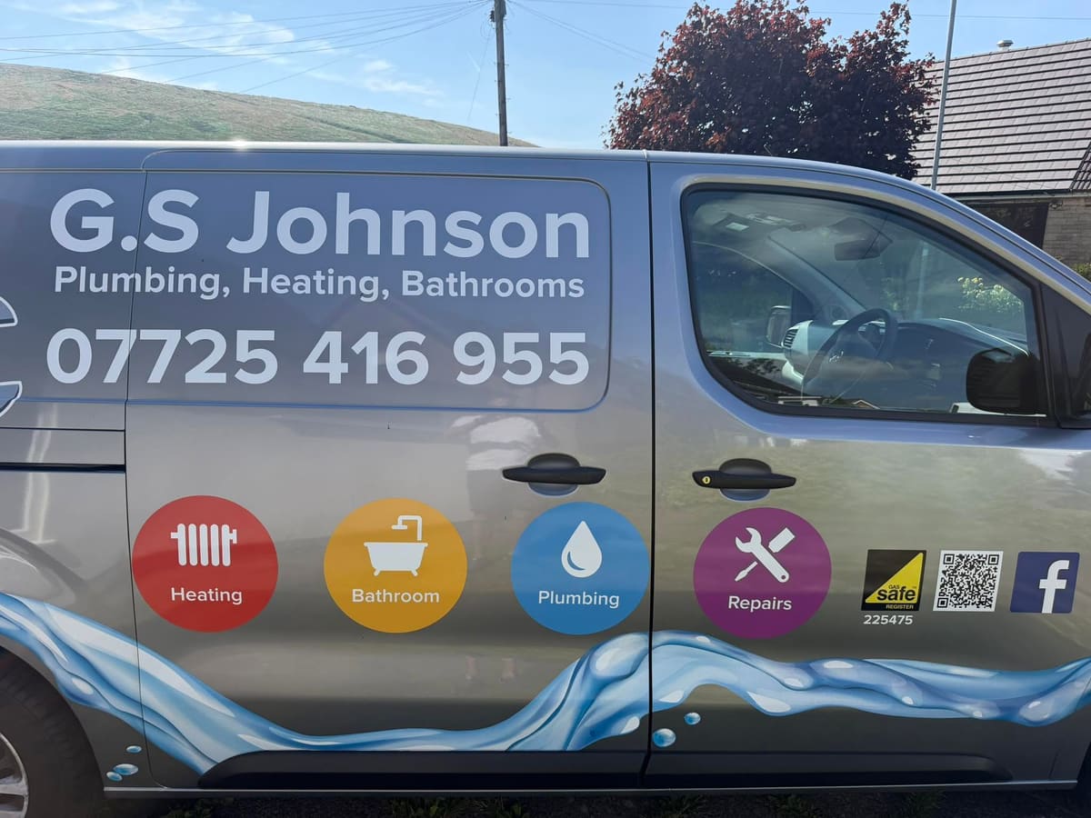Graham's van, signwritten G.S Johnson, Plumbing, Heating, Bathrooms, with four service badges and Gas Safe number 225475